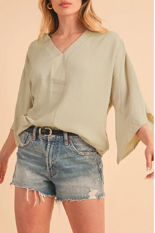 Parchment Solid Color Crinkled V Neck Ruffled Sleeve Blouse