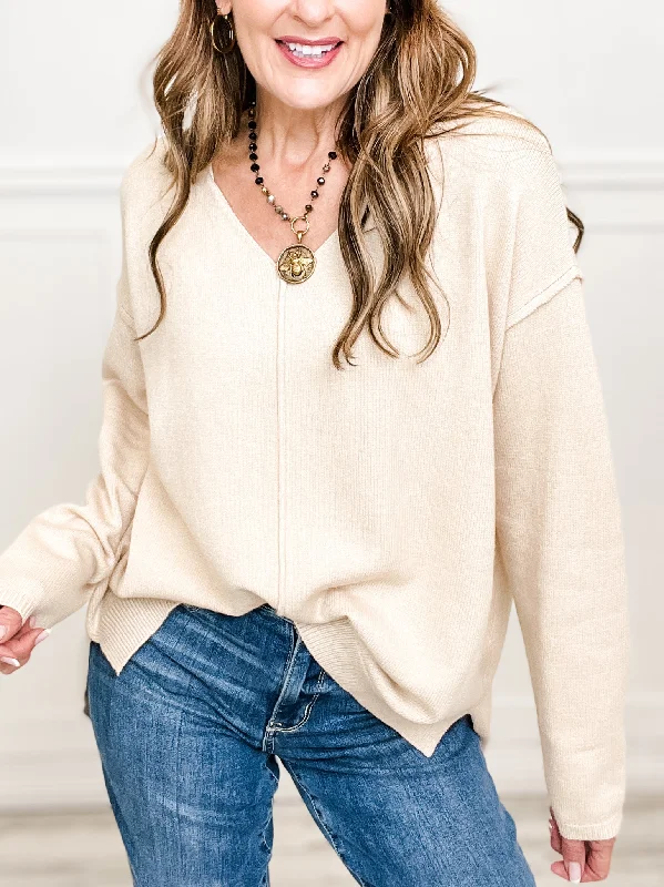 Long Sleeve Center Seam Detail Sweater with V-Neckline and Hi-Lo Hem